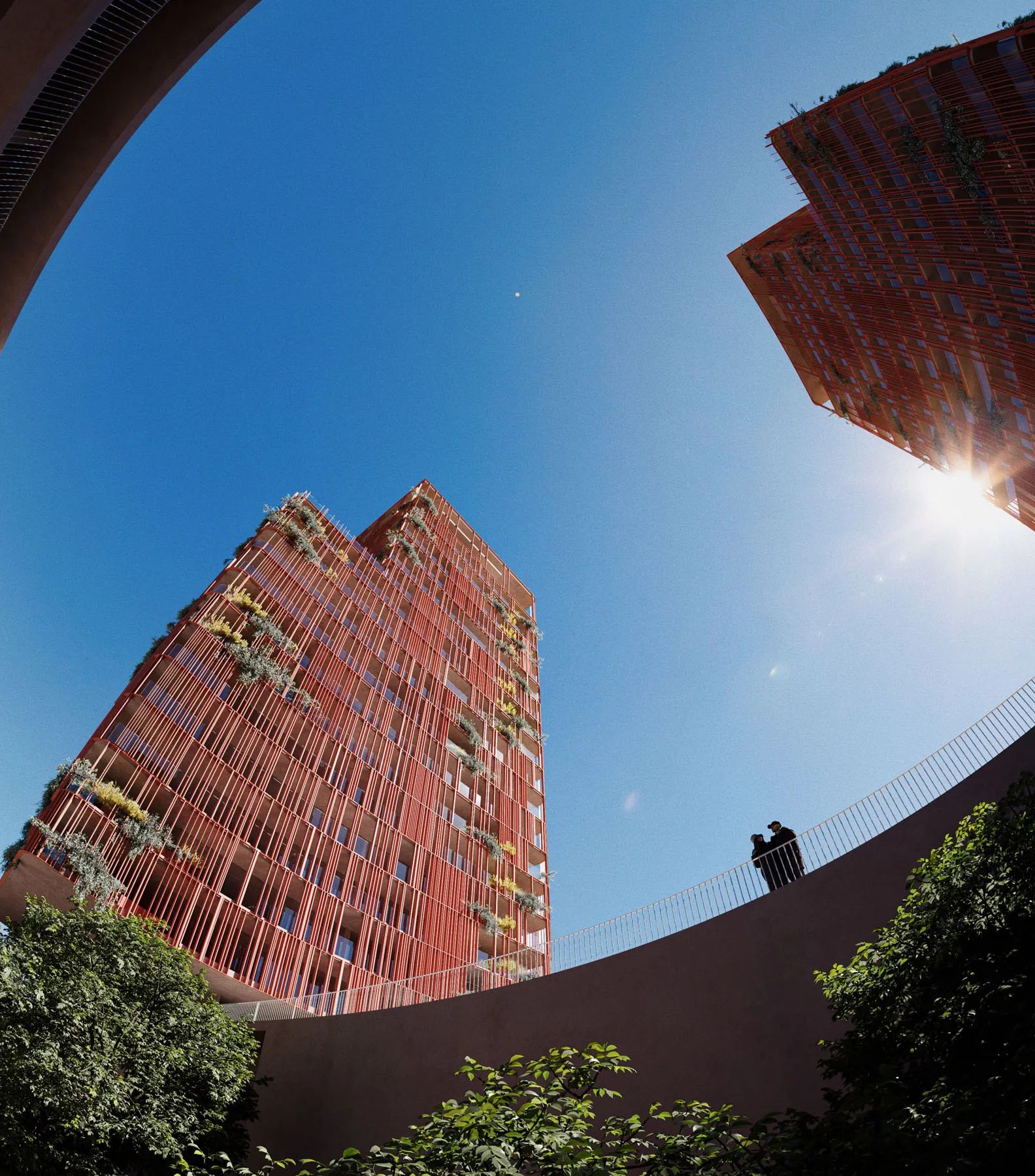 Red tower seen through a fisheye against the sun