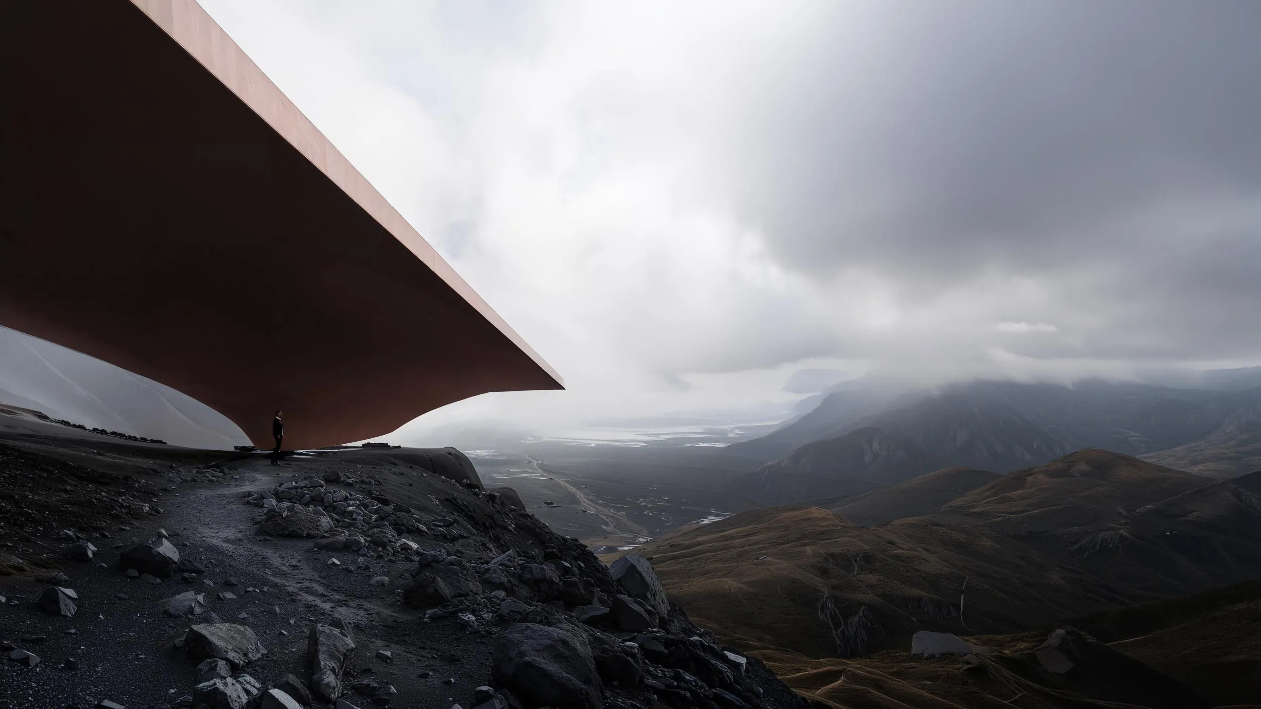 The cantilevered roof and the cloudy mountains