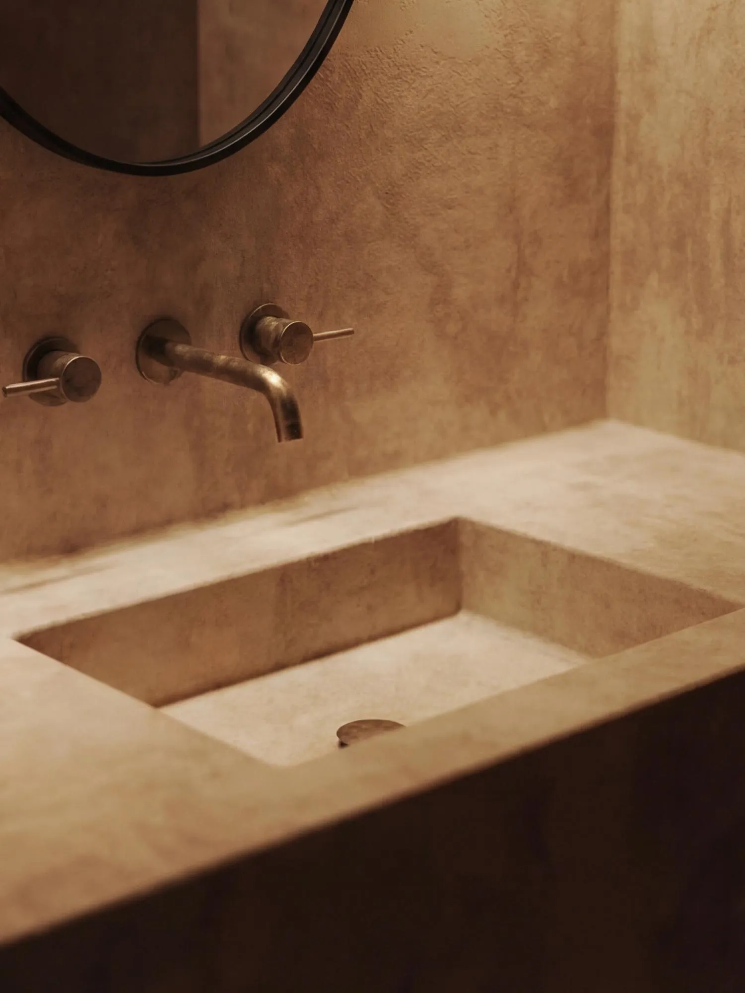 Stone washbasin with brass taps