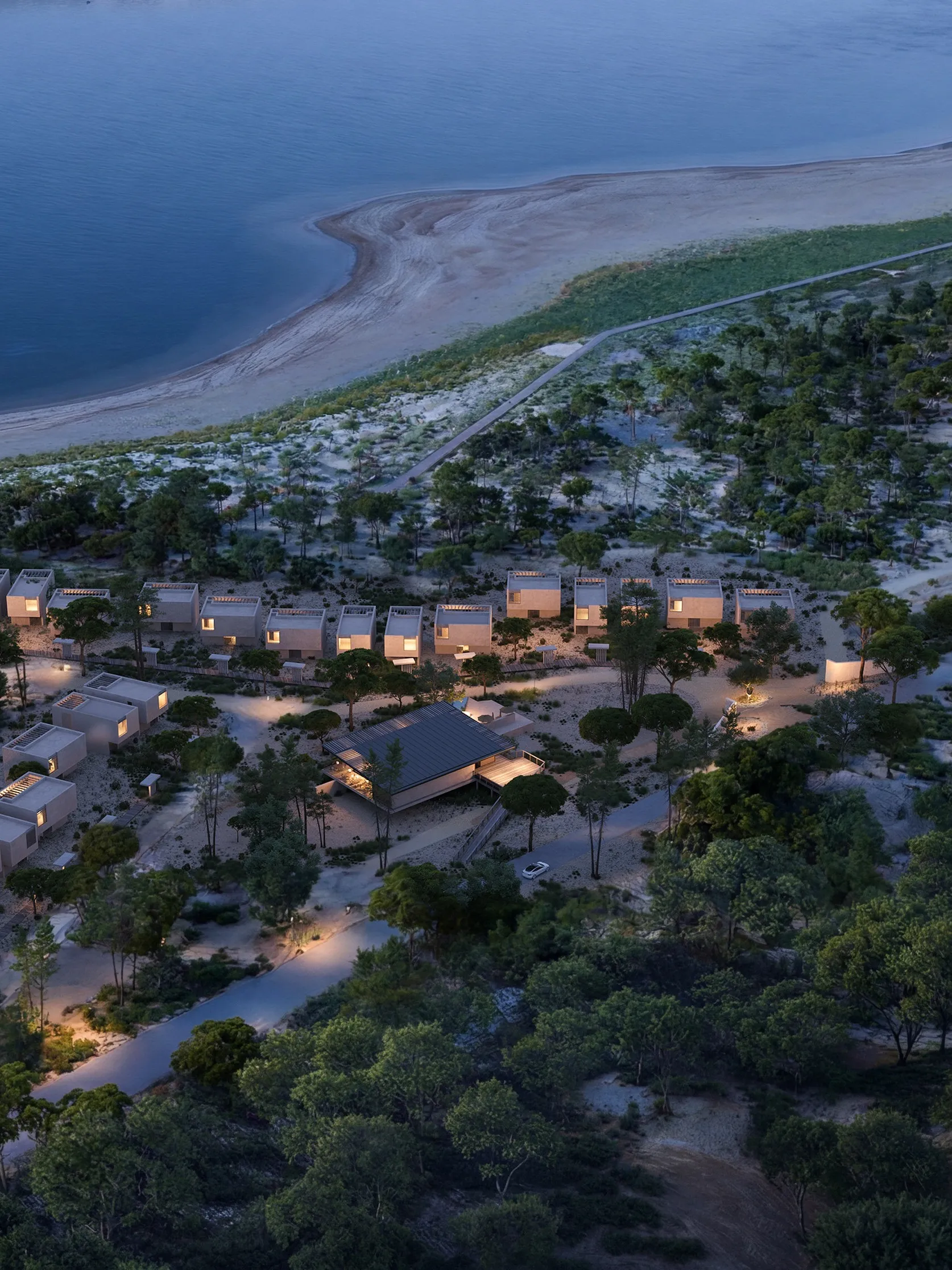 Aerial view of the resort by the sea at dusk