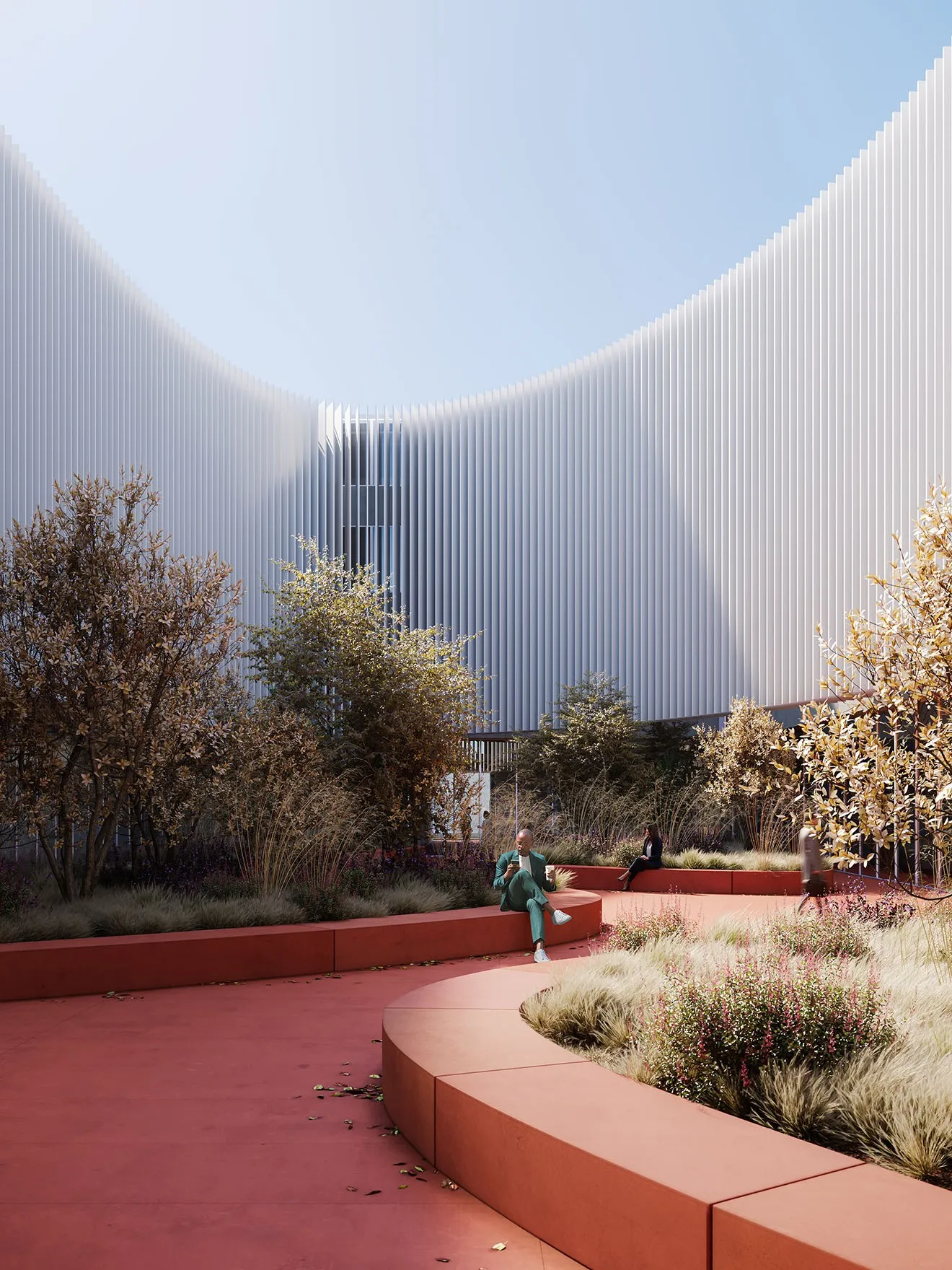 Curved white building above a red terrace