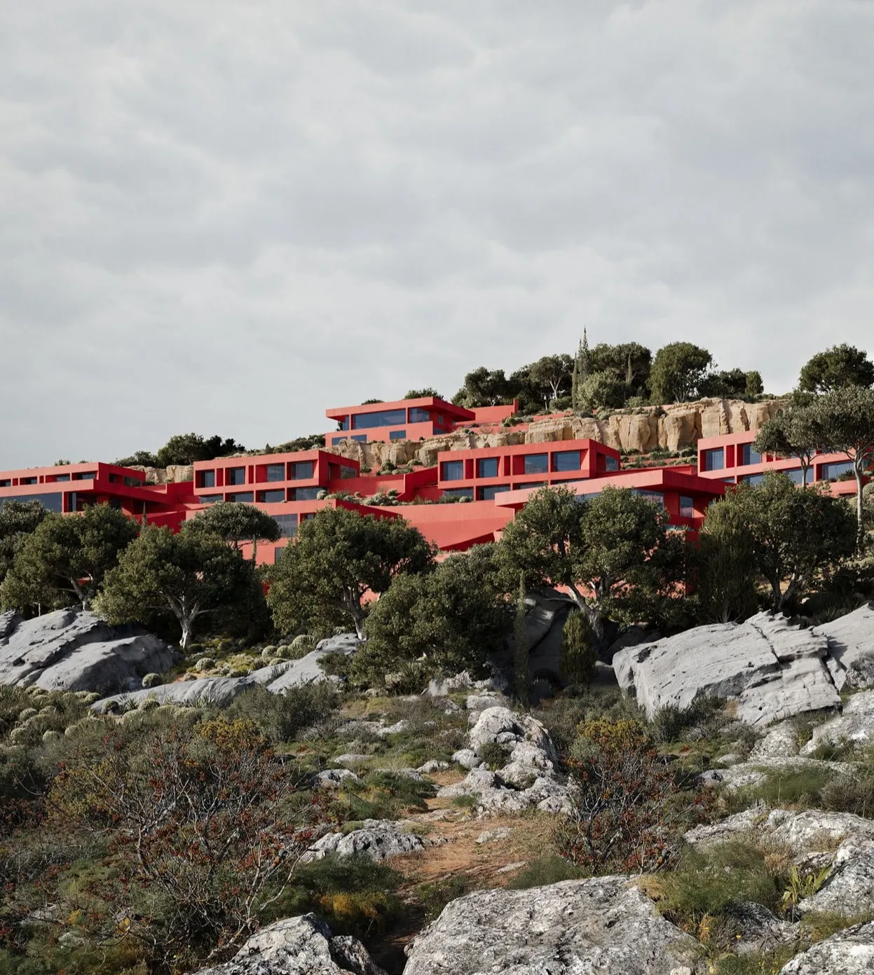 Red houses on the rocky hill