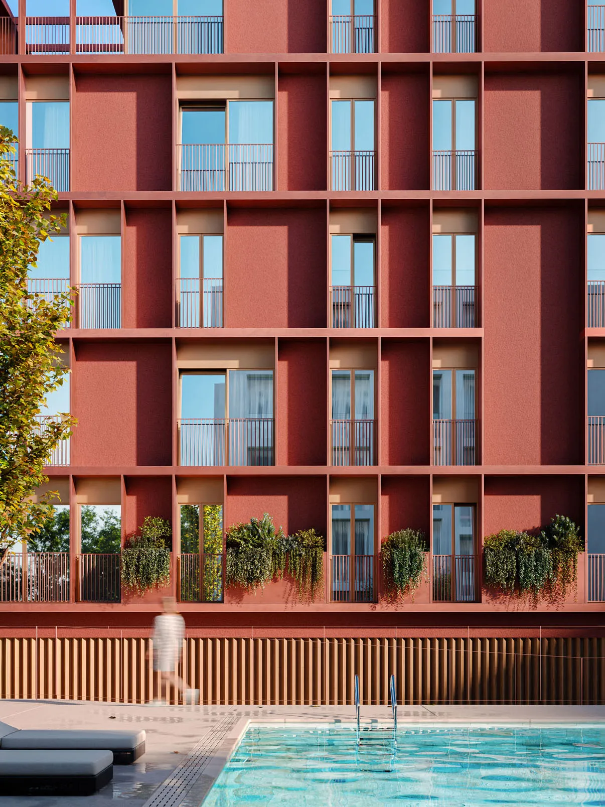 Red building with a pool
